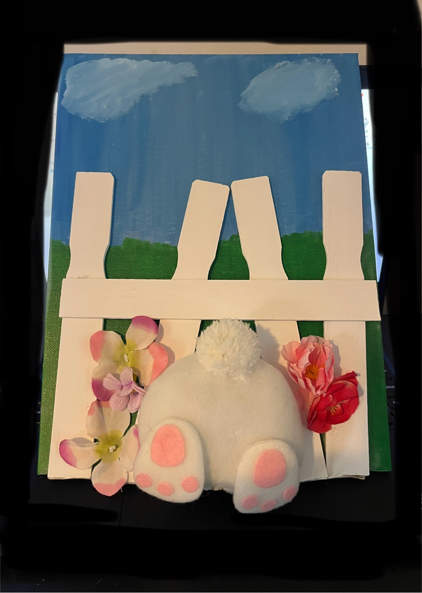 Bunny through a fence decoration