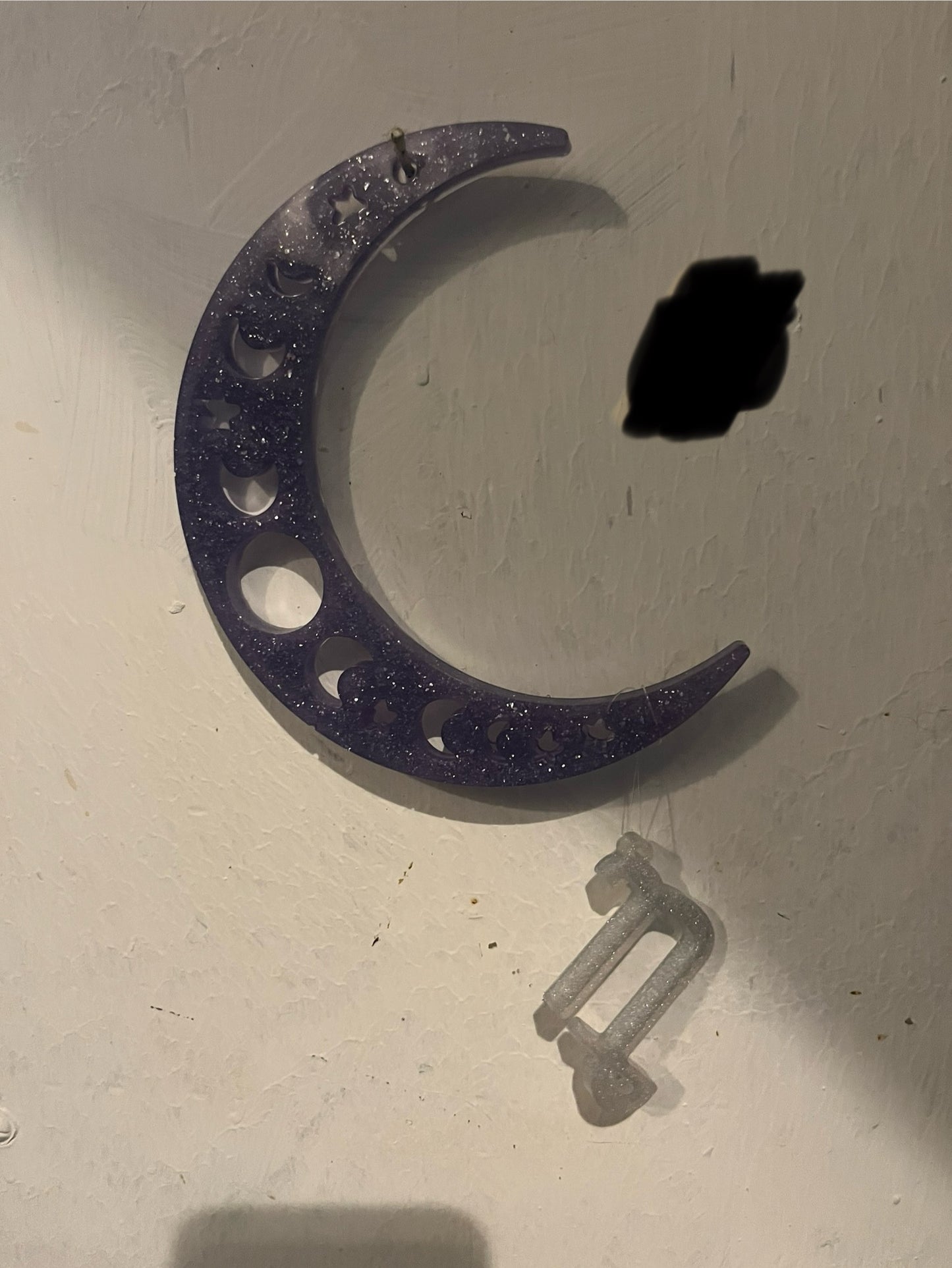 Capricorn horoscope hanging from the moon
