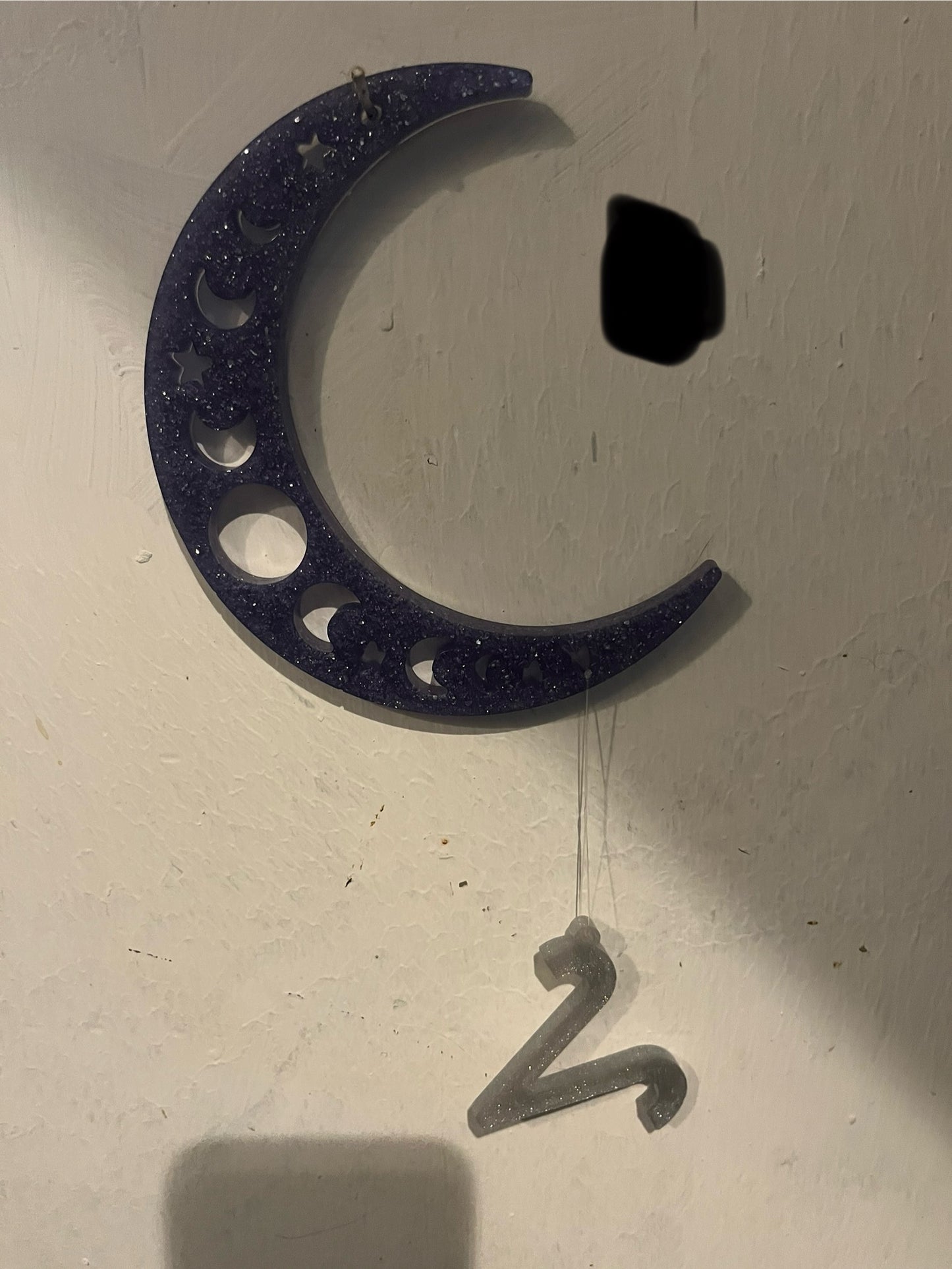 Aries horoscope hanging from the moon