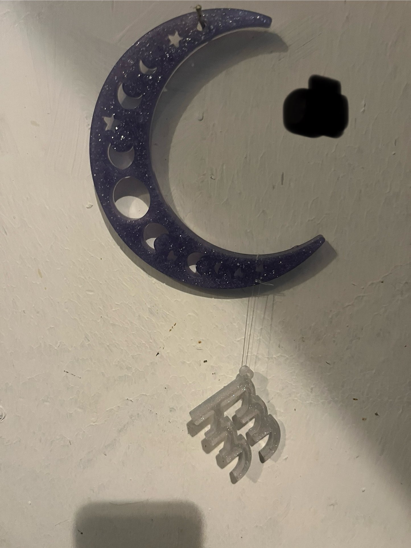 Aquarius horoscope hanging from the moon