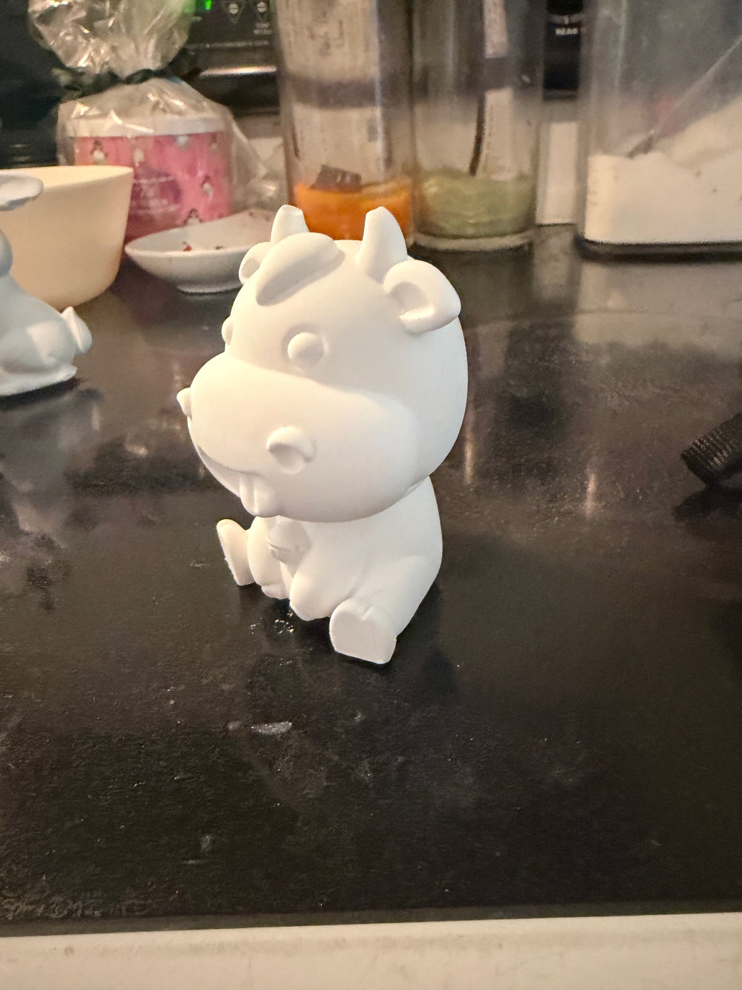 Paint your own sassy cow statue