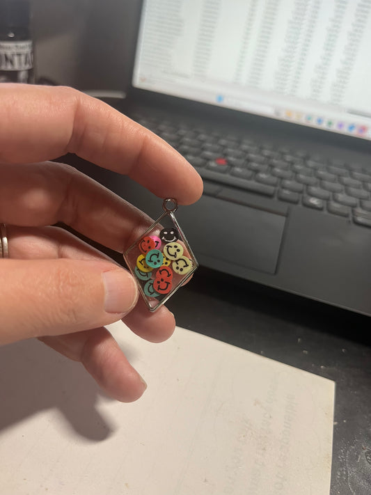 Clay smileys in a pendant