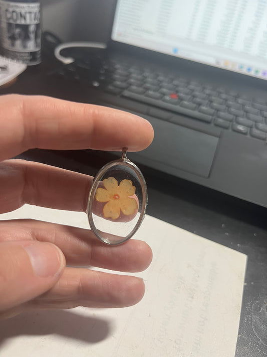 Orange flower pendant