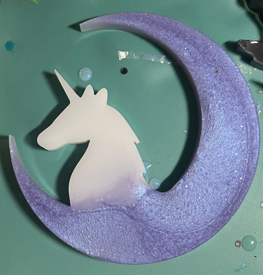White unicorn on a purple moon