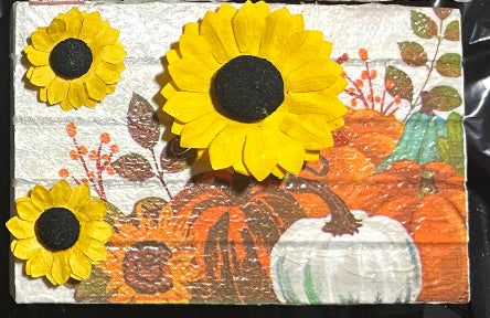 Pumpkins and sunflowers
