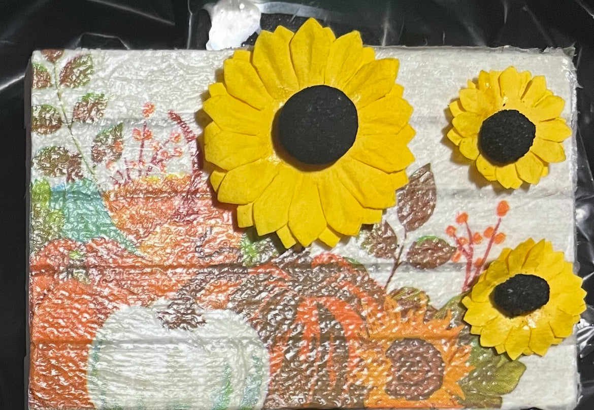 Pumpkins and sunflowers