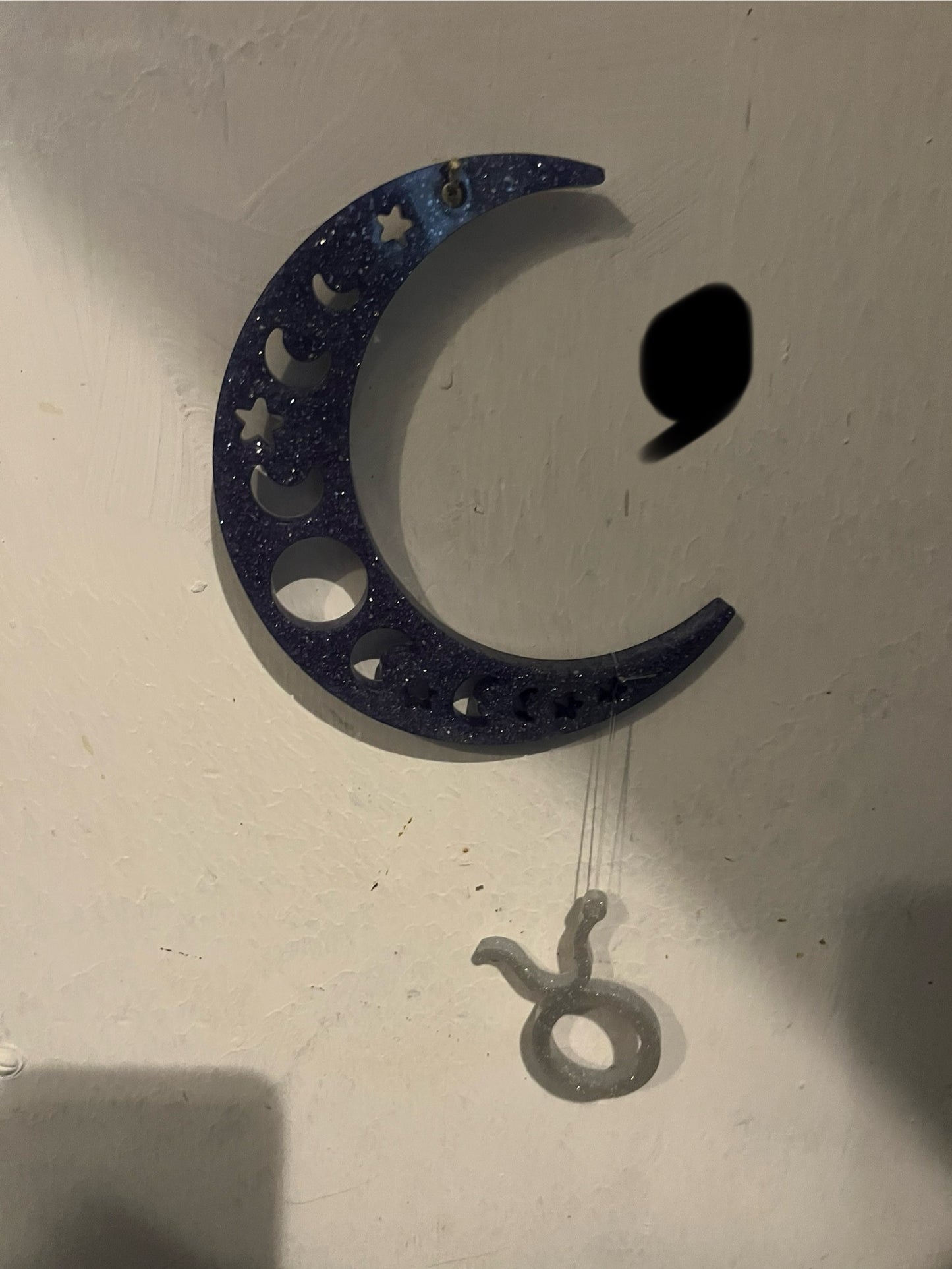 Taurus horoscope hanging from the moon