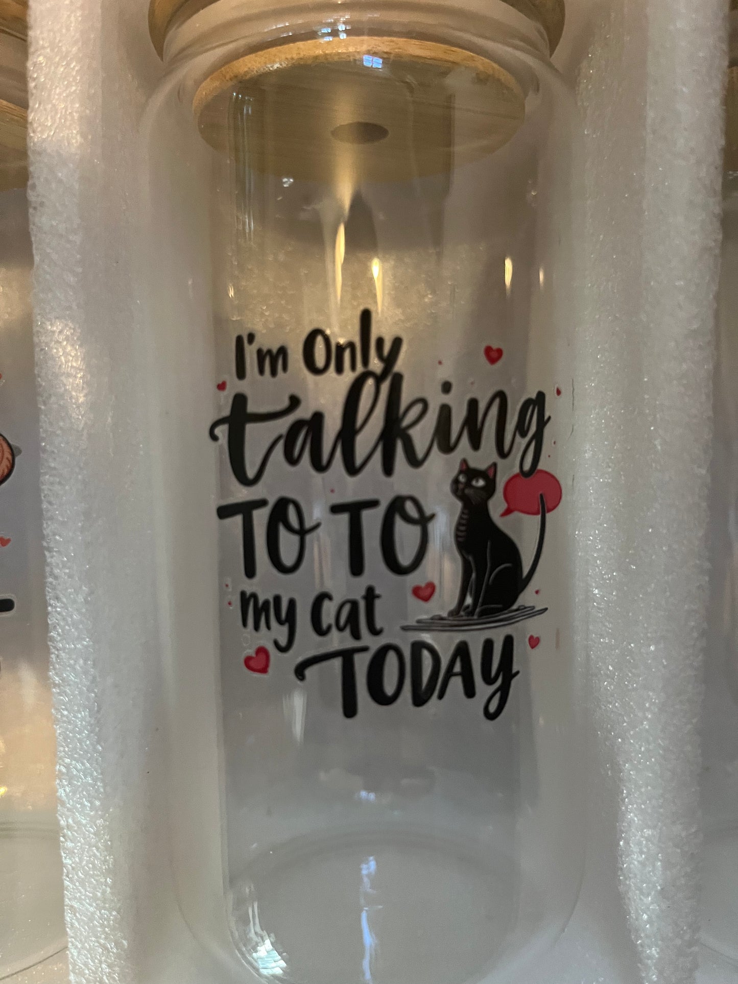 I’m only talking to my cat today drinking glass