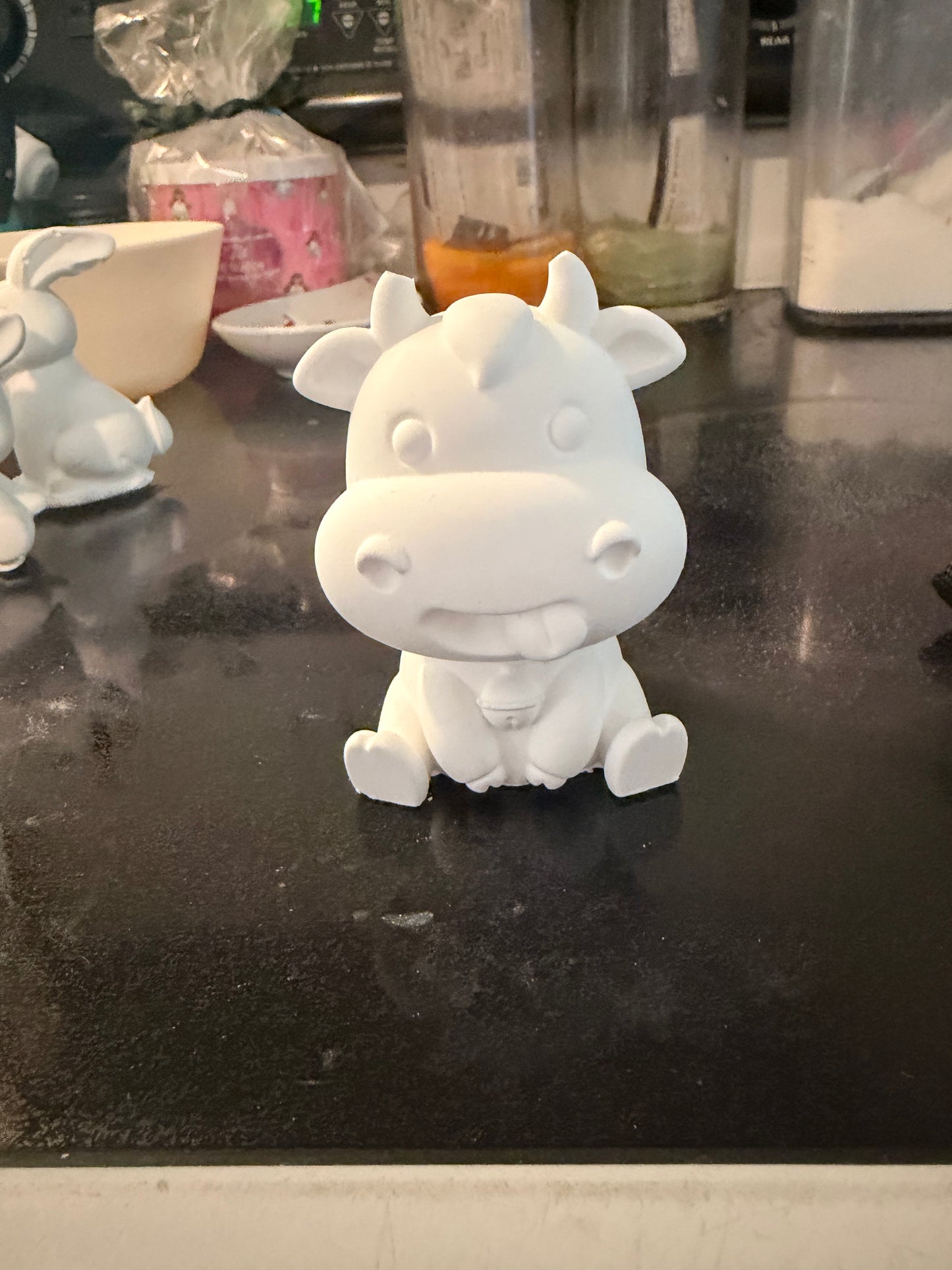 Paint your own sassy cow statue