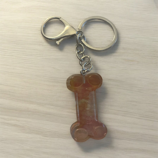 Dog bone keychain - orange swirl