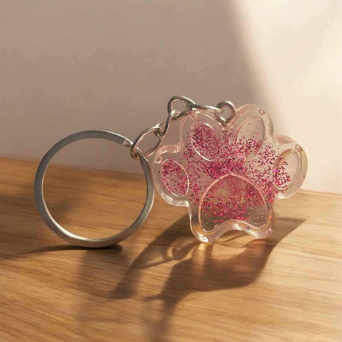 Paw keychain - clear with pink glitter