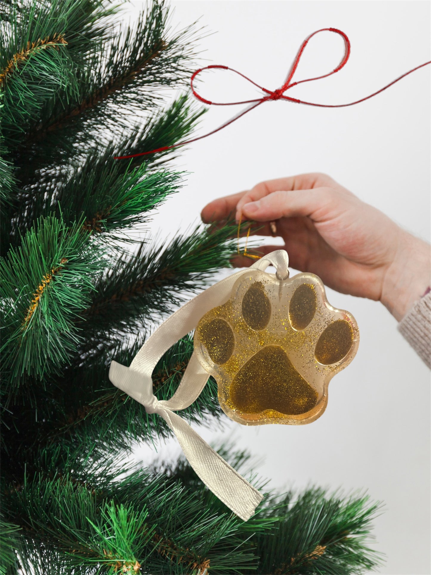 Paw print ornament - yellow glitter