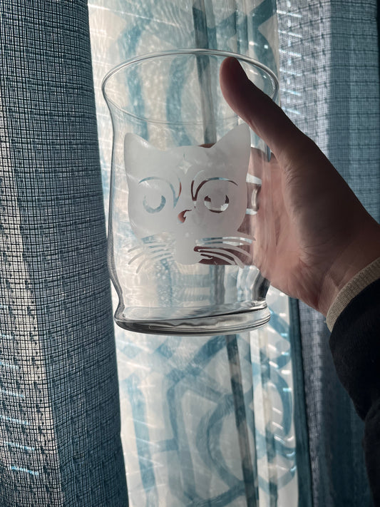 Etched cat on vase